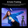 A woman in a blue jacket demonstrates AI auto-tracking using a camera mounted on a tripod.