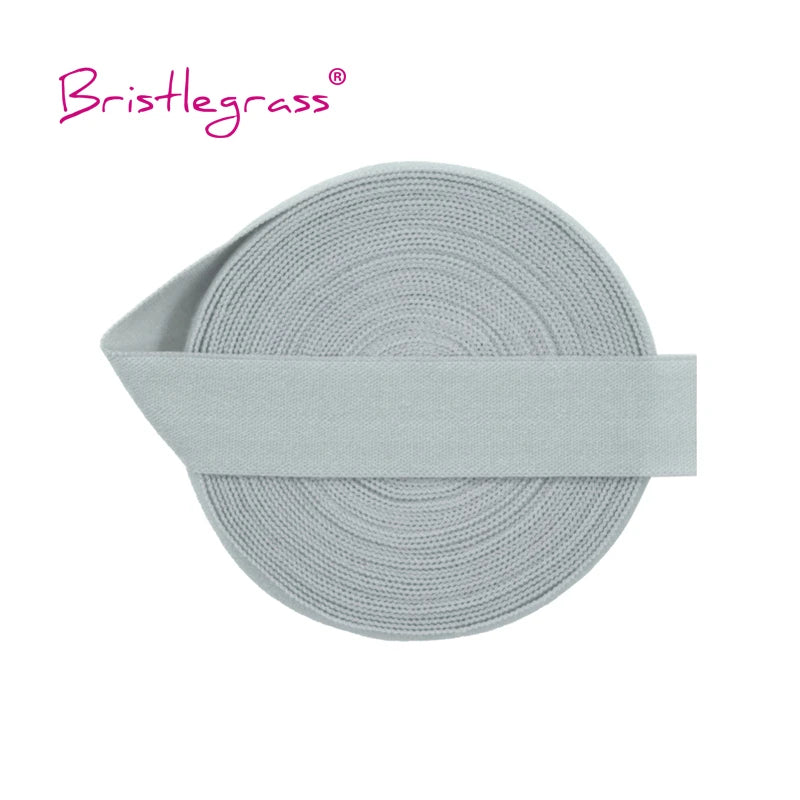 A roll of light gray adjustable spandex elastic hair ties and trims.