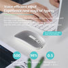 A gray AI voice typing mouse is shown next to a laptop, demonstrating voice input for typing.