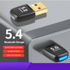 Adaptador Bluetooth negro de 5.4 junto a un puerto de computadora plateado, destacando su uso para audio y conectividad.