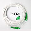A coil of 120 meters of white single-mode fiber optic cable with green connectors.