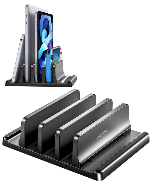 A black vertical laptop stand organizer holding three smartphones and a tablet.