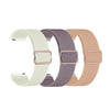 Three colored elastic sports bands for Garmin watches: cream, purple, and peach.