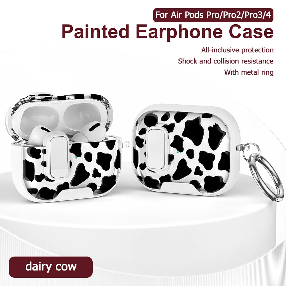 Estuche protector de silicona con estampado de vaca pintado para AirPods Pro, mostrado con un anillo metálico.