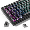 A close-up view of a black mechanical keyboard with crystal clear RGB keycaps and various modifier keys.