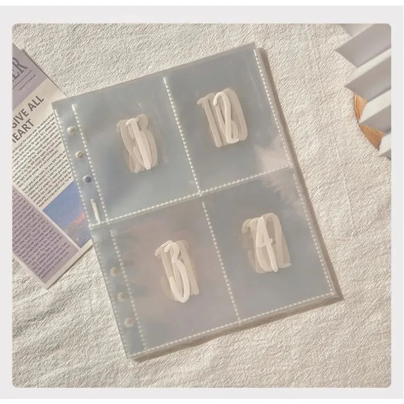 A set of clear plastic envelopes with numbered labels for document organization