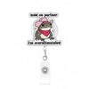 A clear acrylic nurse badge reel featuring a frog wearing a pink hat and a red bandana with text that reads I'm overstimulate