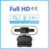 A black 4K streaming webcam with a built-in microphone and features for auto focus and noise reduction.
