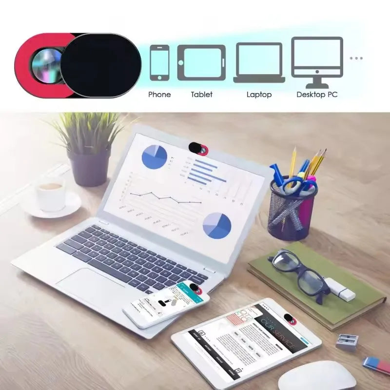 A laptop is shown with various privacy sliders and accessories, including a mobile phone and tablet.