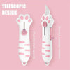 White cat paw-shaped box cutter with a titanium blade shown against a pink background.