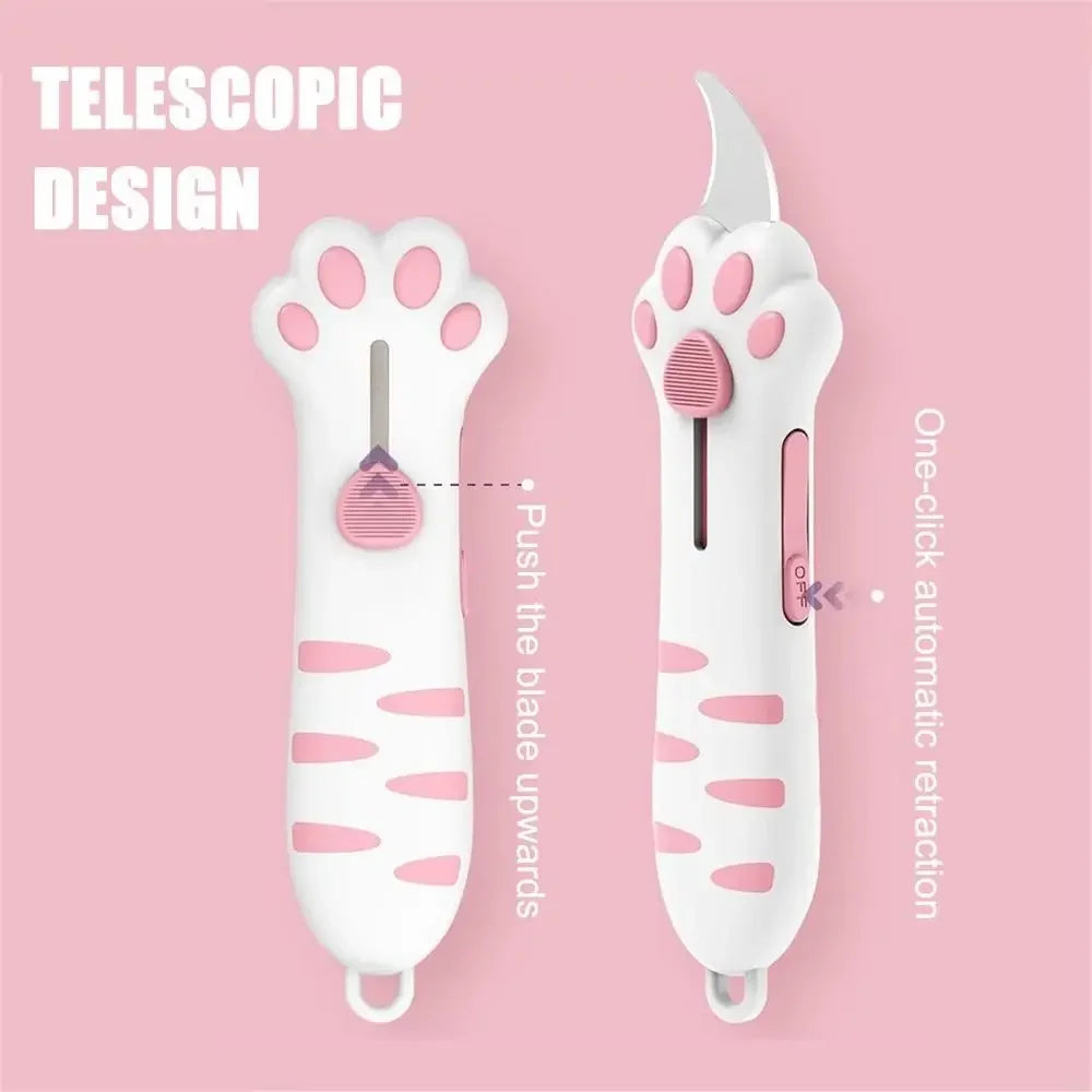 White cat paw-shaped box cutter with a titanium blade shown against a pink background.