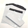 A stack of clear plastic waterproof packaging bags for shipping.