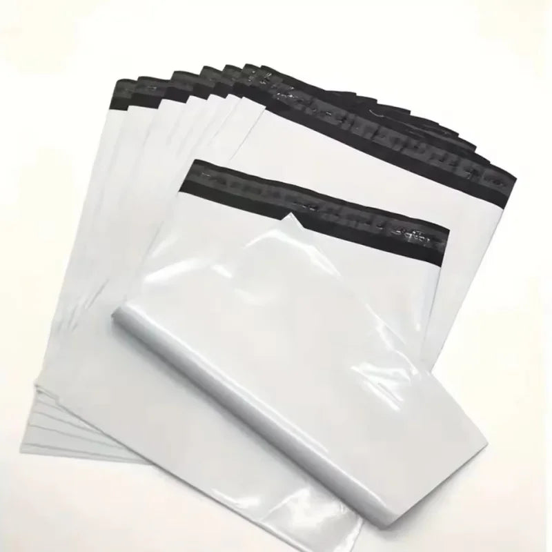 A stack of clear plastic waterproof packaging bags for shipping.