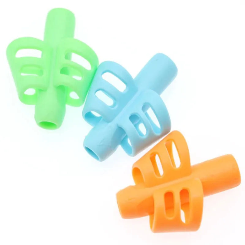 A set of three silicone pencil grips in lime green, light blue, and orange.