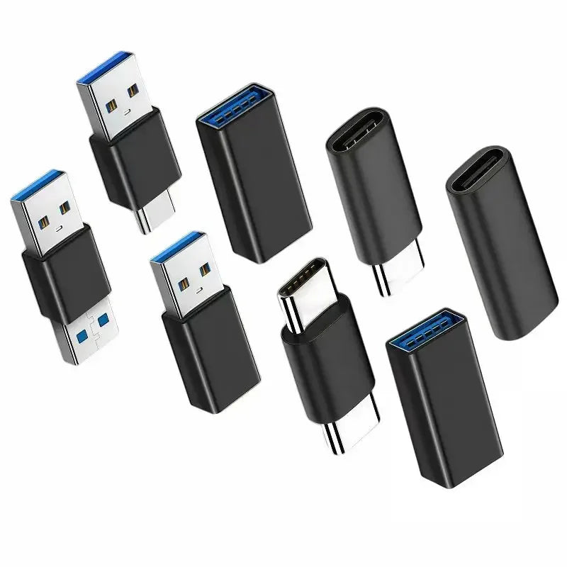 A collection of black USB-C adapters for fast data transfer and charging.