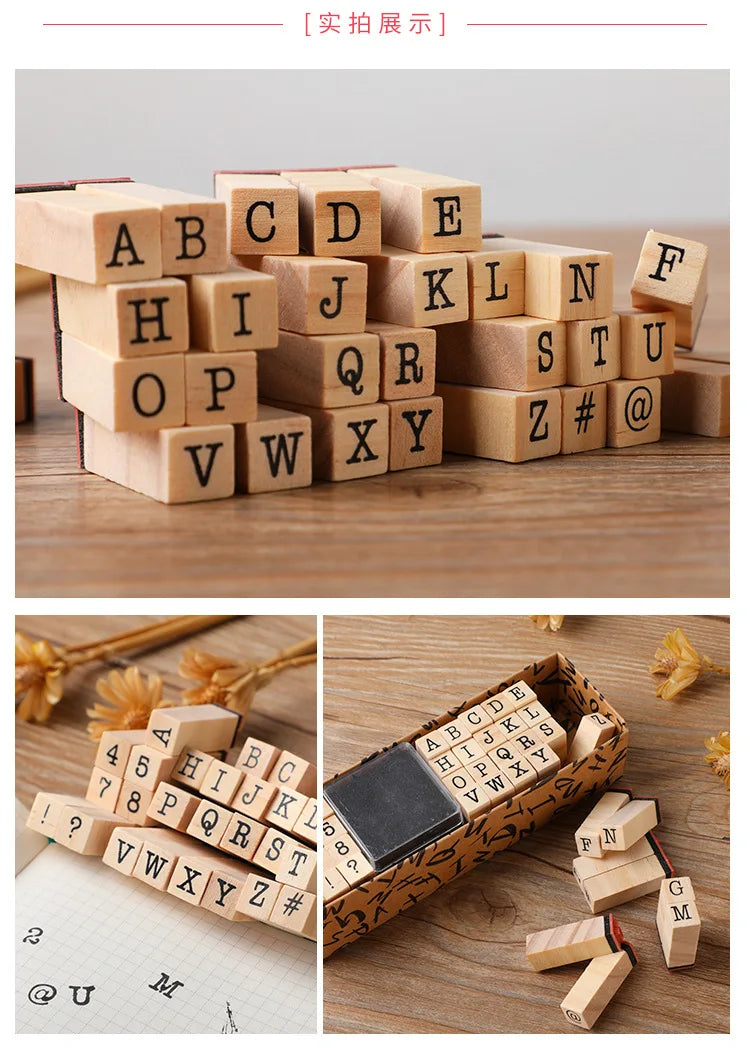 A collection of wooden alphabet stamp seals arranged in rows on a wooden surface.