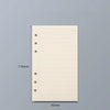 Cuaderno suelto de hojas claras beige con líneas rayadas y encabezado de lista de tareas, mostrado contra un fondo gris.