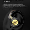 A close-up view of KZ EDX PRO dynamic earphones with a gold accent on a black background.