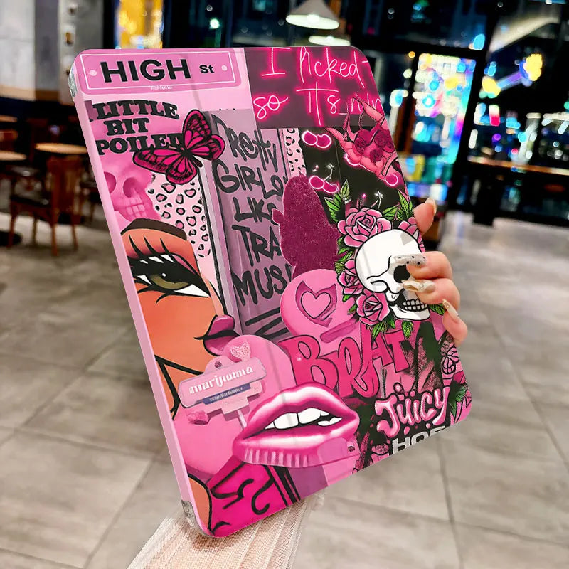 A pink tablet case featuring a vibrant graphic design with text and floral elements is held in a hand.