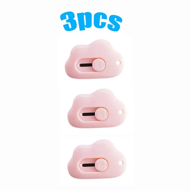 Three pink rabbit cloud utility knives displayed individually.