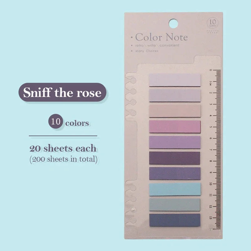 A pack of 10 Color Note sticky notes in various shades of pink and purple, with a ruler for size reference.