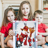 Drei Kinder halten ein Diamantmal-Set mit einem Schneemann und festlichen Elementen.