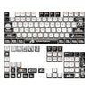A close-up view of PBT sublimated shark keycaps for mechanical keyboards showing various letter and function keys.