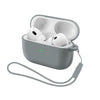 A gray silicone earphone case with a strap is open, showing two white earbuds inside.