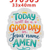 A white acrylic hair bow with a yellow sunburst design and the text Today will be a good day in Jesus' name Amen