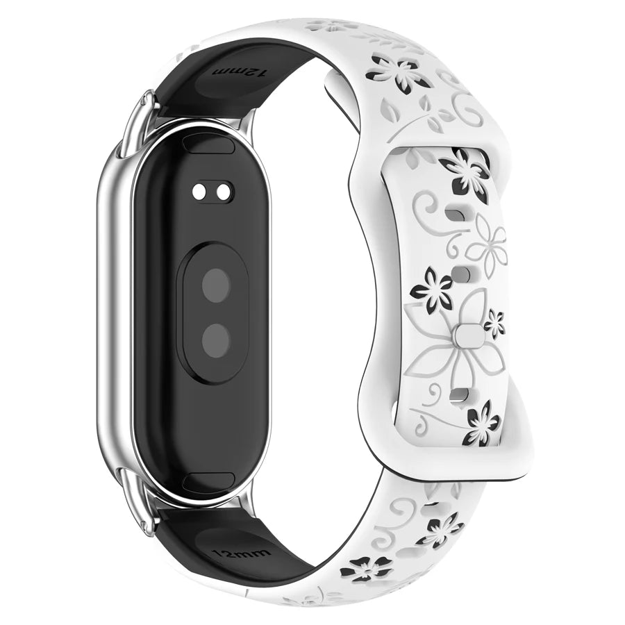 A white silicone watch band with 3D engraved flowers and a black smart band casing.