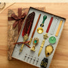 A two pen set featuring a fountain pen, ink, and wax seal kit displayed on a wooden surface.