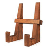 A wooden cookbook holder or recipe stand with a sturdy design for kitchen counters.