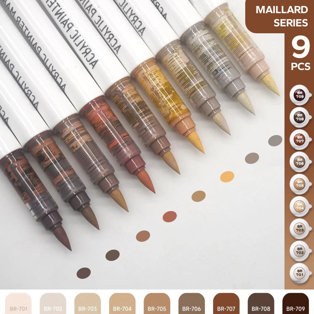A collection of nine MAILLARD series acrylic brush markers in various shades and tips arranged diagonally on a white backgrou