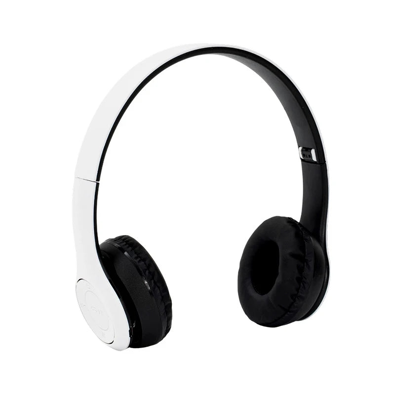 A pair of white over-ear headphones with black earcups and a headband shown against a white background.