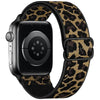 A black Apple Watch with a leopard print nylon band featuring gold and black patterns.