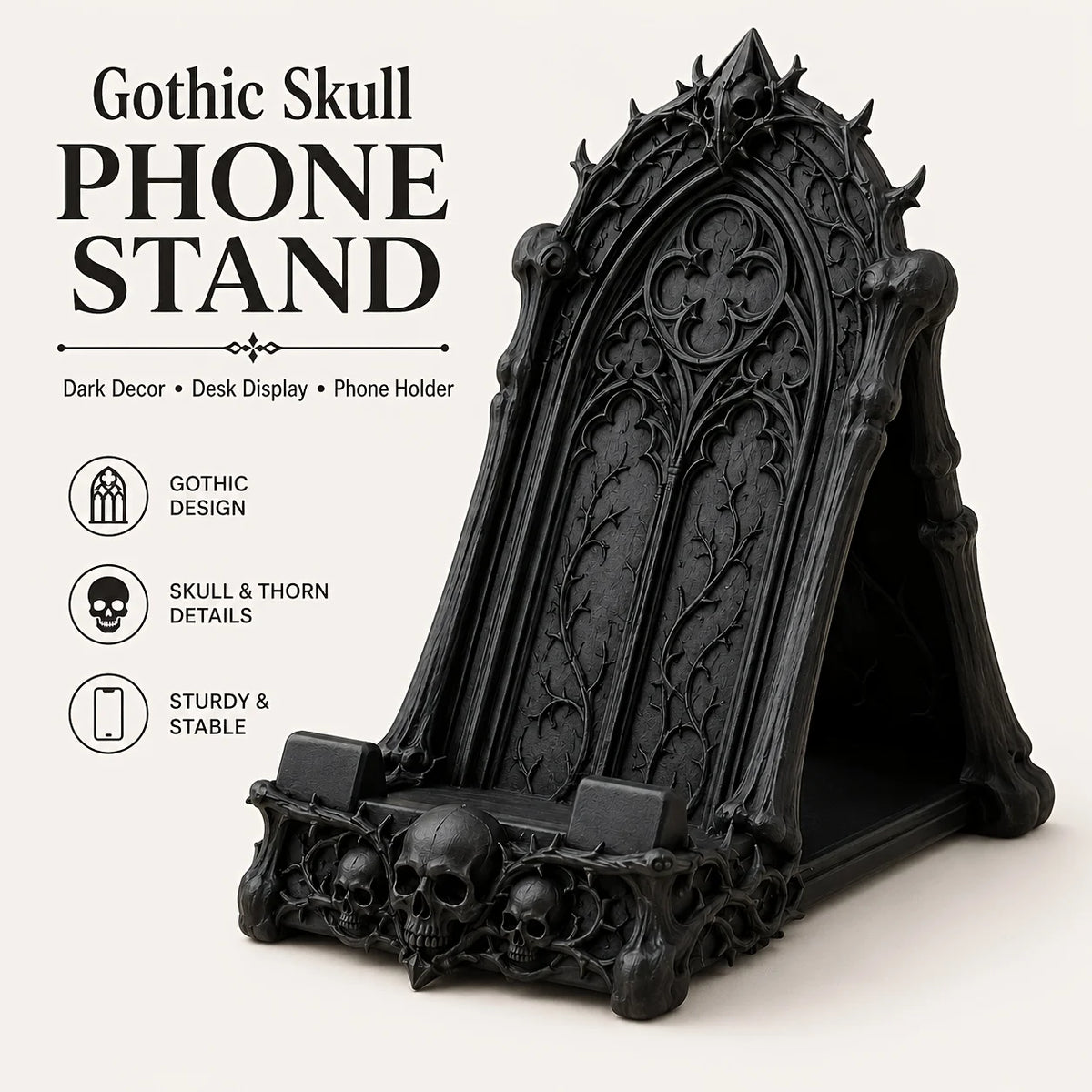 A black gothic skull phone stand with intricate carvings and a decorative arched design.
