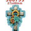 A wooden cross decorated with a sunflower and roses, set against a light blue background.