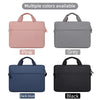 A set of four premium laptop sleeves in pink, grey, dark blue, and black with carrying handles.