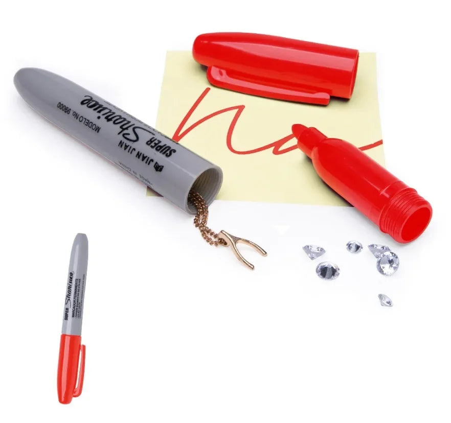 A set of red and silver marker pens, including a hidden compartment pen and a standard pen, displayed on a white background.