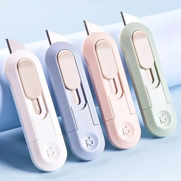 A set of five compact mini paper cutters in various pastel colors, including pink, lavender, and mint green.