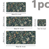 A collection of three floral design mouse pads in various sizes and colors with non-slip rubber bases.