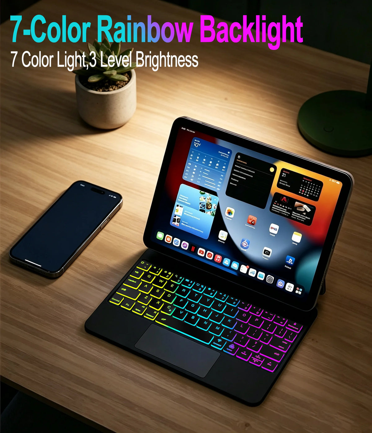 A tablet is shown with a slim Bluetooth keyboard case featuring 7-color rainbow backlight on the keys and trackpad.