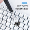 A black mechanical keyboard keycap puller is shown above a white keyboard, demonstrating how to easily pull up keycaps.