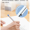 A hand is writing on paper with a white pen, illustrating the concept of low-center-of-gravity design and enhanced feel.
