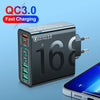 A black QC3.0 fast charging wall adapter with multiple USB ports shown next to a smartphone.