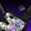 A close-up view of a magnetic switch mechanical keyboard showing various colored switches and components.
