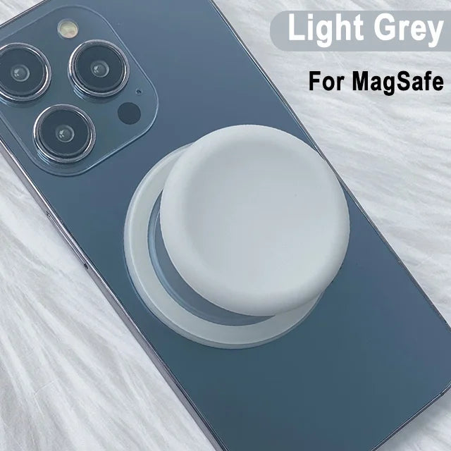 Light grey phone case featuring a magnetic grip stand with a silicone cover.