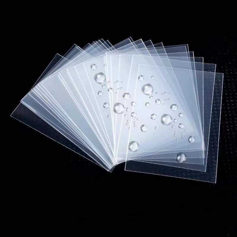 A fan of clear protective card sleeves showing various bubble-shaped plastic sheets.