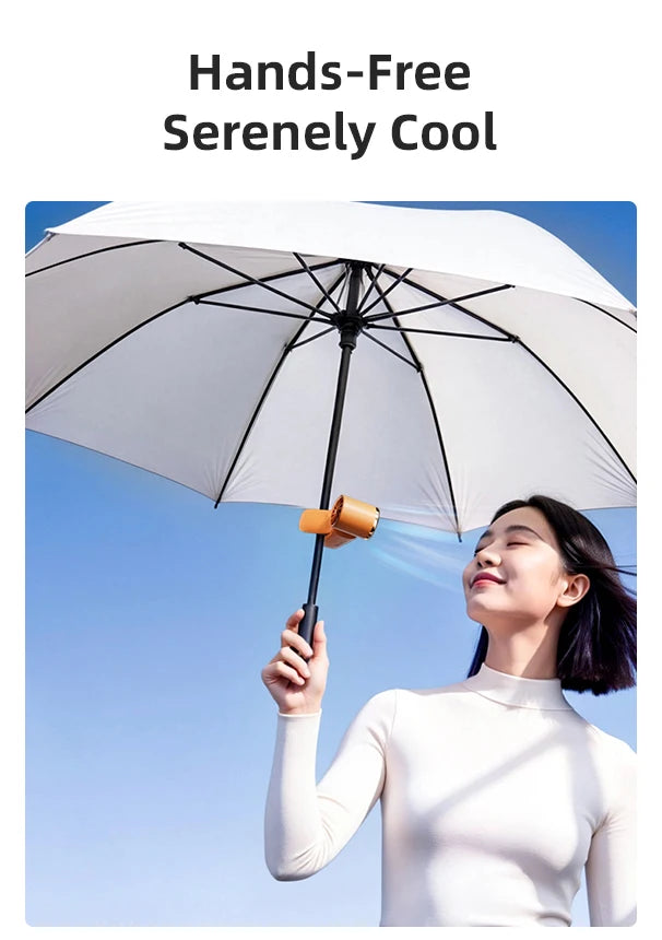 A woman is using a large white umbrella to create a cool breeze while holding a portable rechargeable cooling fan.