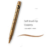 A close-up of a metallic brush pen with a soft tip, showing the gold color and line width.